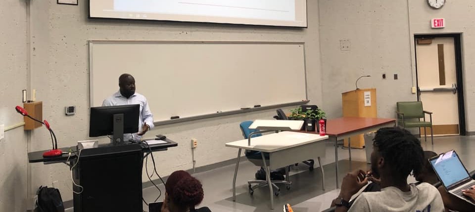 Richard Koranteng speaking to a student audience